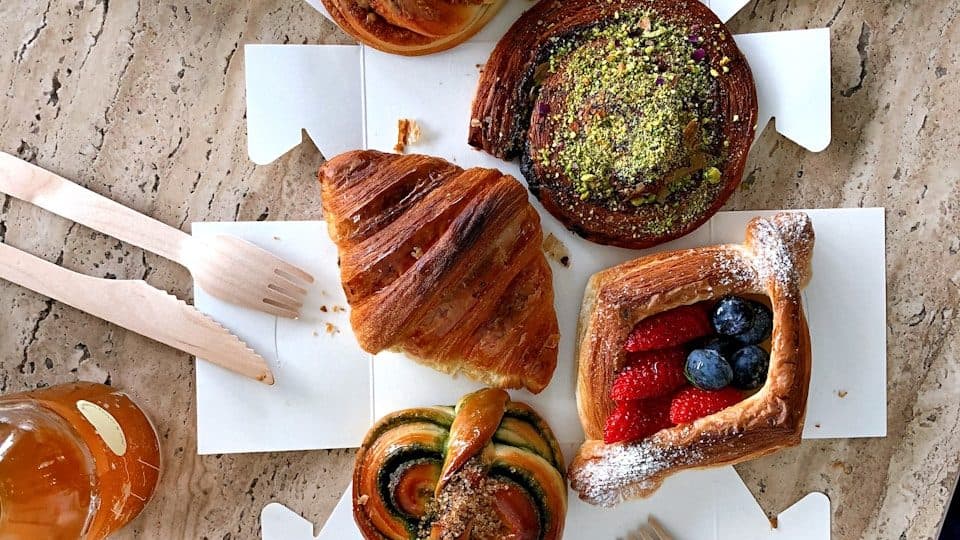 brown and green dish on white ceramic plate